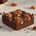 Walnut brownie square with chunky walnuts on top